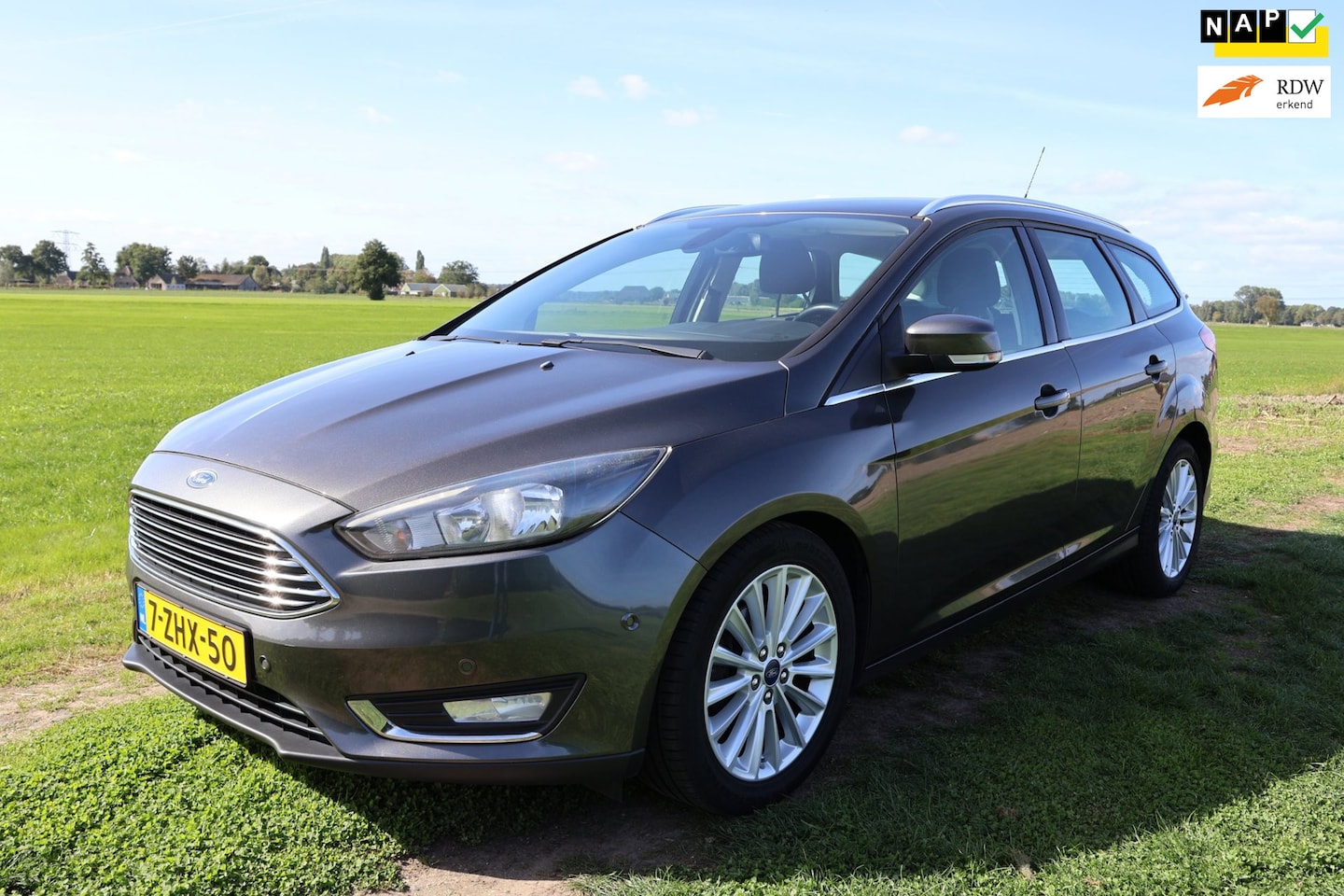 Ford Focus Wagon - 1.0 First Edition|Airco|Bluetooth|Navi|NL-auto-NAP|6 bak - AutoWereld.nl