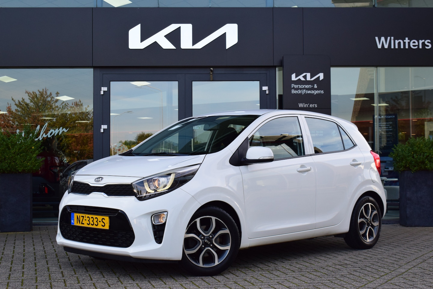 Kia Picanto - 1.0 CVVT First Edition Navigatie | Camera \ Climate Control | Cruise Control | LED | Tot 1 - AutoWereld.nl