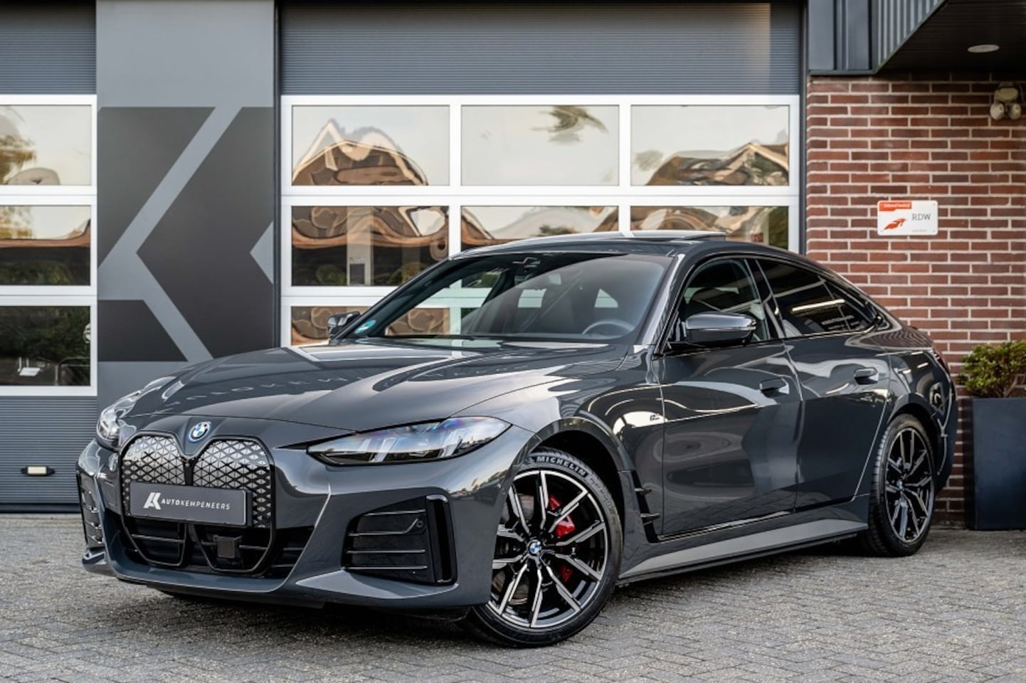 BMW i4 - xDrive40 M Sport Pro | Schuifdak | Harman/Kardon | 360 Camera | Memory | Stoelverwarming V - AutoWereld.nl
