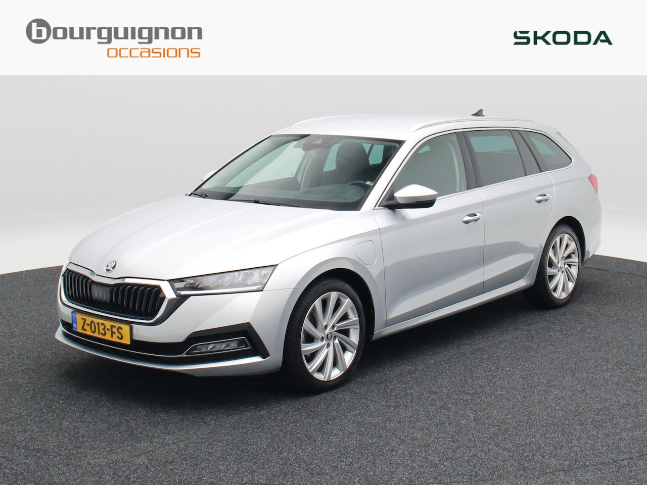 Skoda Octavia Combi - 1.4 TSi iV 204 Pk PHEV Business Edition | Stoel/Stuurverwarming | Trekhaak | Navigatie | 1 - AutoWereld.nl