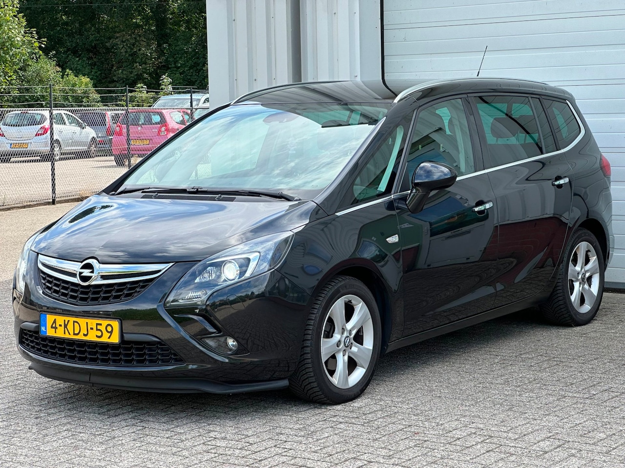 Opel Zafira Tourer - 1.4 T Cosmo 7p. Cruise, Clima, Xenon, Half Leder, Nap! - AutoWereld.nl