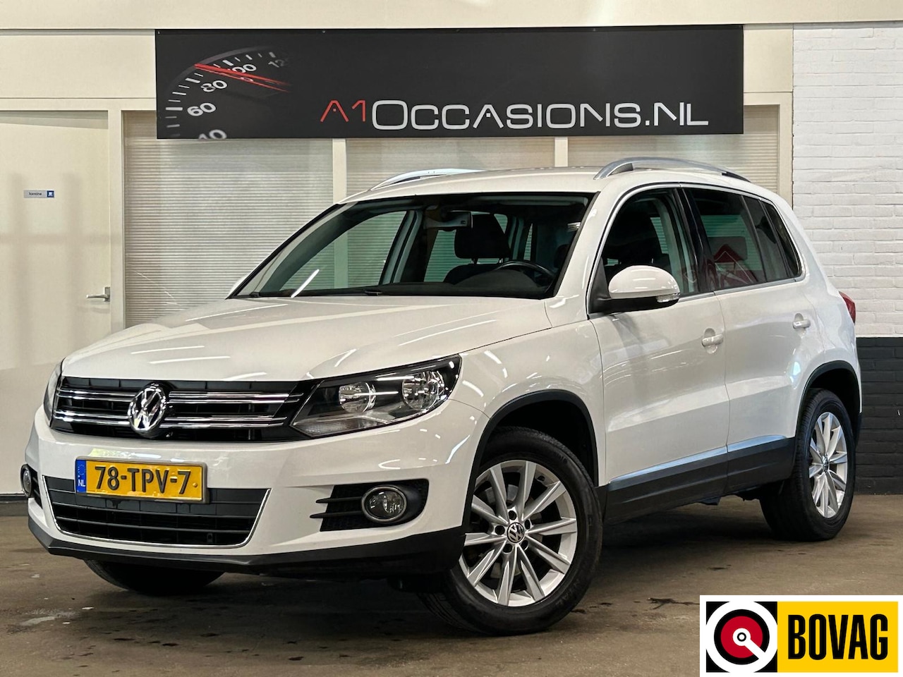Volkswagen Tiguan - 1.4 TSI Sport&Style - AutoWereld.nl