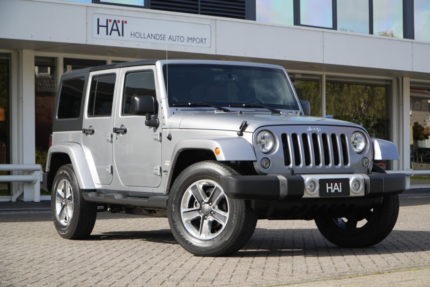 Jeep Wrangler Unlimited - 3.6 V6 automaat Sahara I Hardtop I Leder I 18 inch - AutoWereld.nl