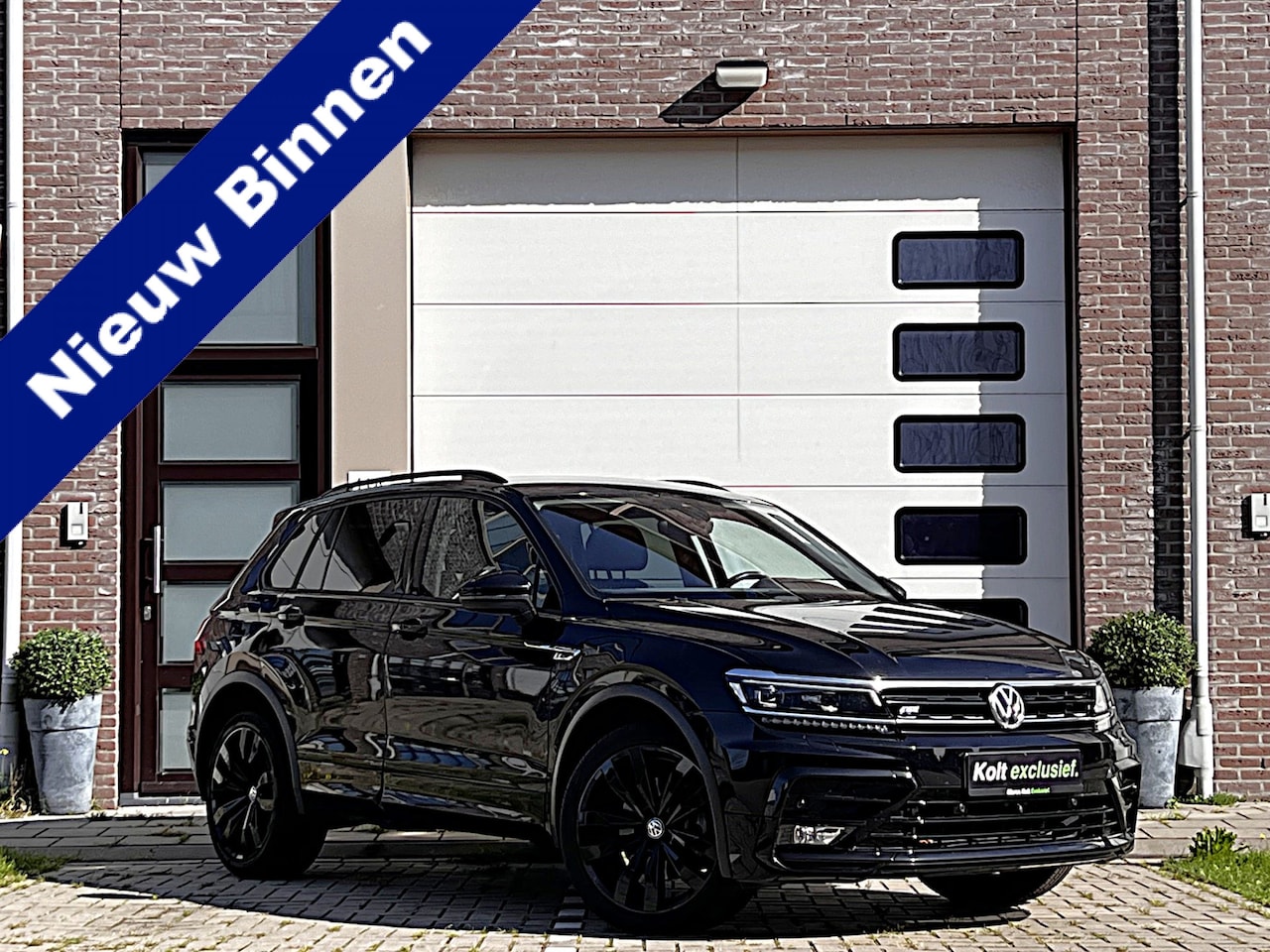 Volkswagen Tiguan - 2.0 TDI 4Motion Highline Business R Black Style / Head Up / 360 Camera / Adaptief Demping - AutoWereld.nl