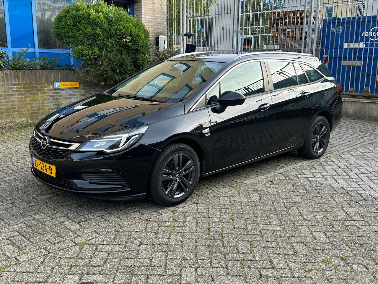 Opel Astra Sports Tourer - 1.0 Turbo 120 Jaar Edition 1.0 Turbo 120 Jaar Edition - AutoWereld.nl