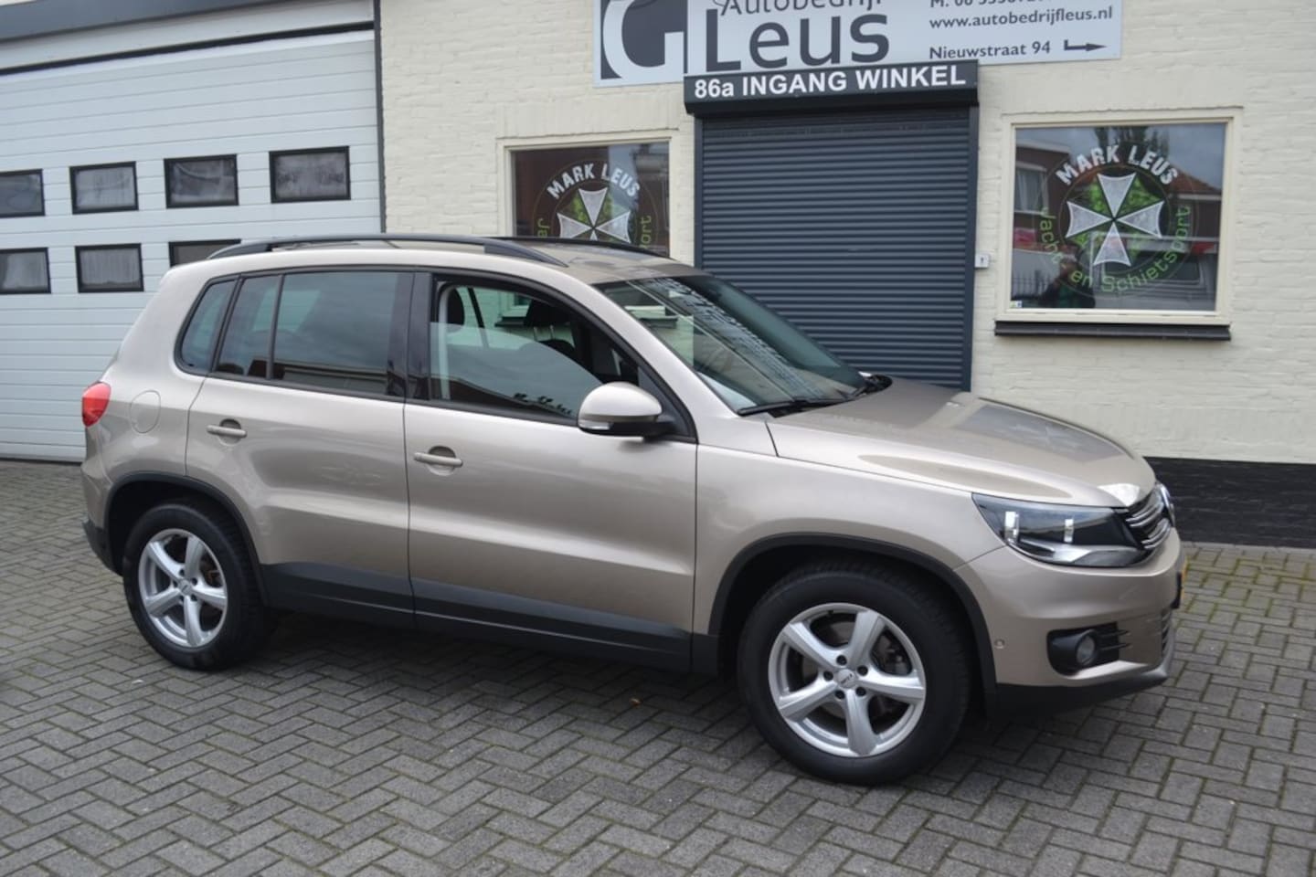 Volkswagen Tiguan - 1.4 TSI Comfort&Design Edition 1e eigenaar - AutoWereld.nl