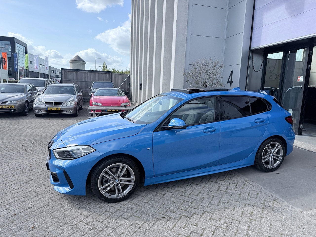BMW 1-serie - 118i M Edition! PANO! LEER! LED! NAP! INRUIL MOGELIJK! - AutoWereld.nl