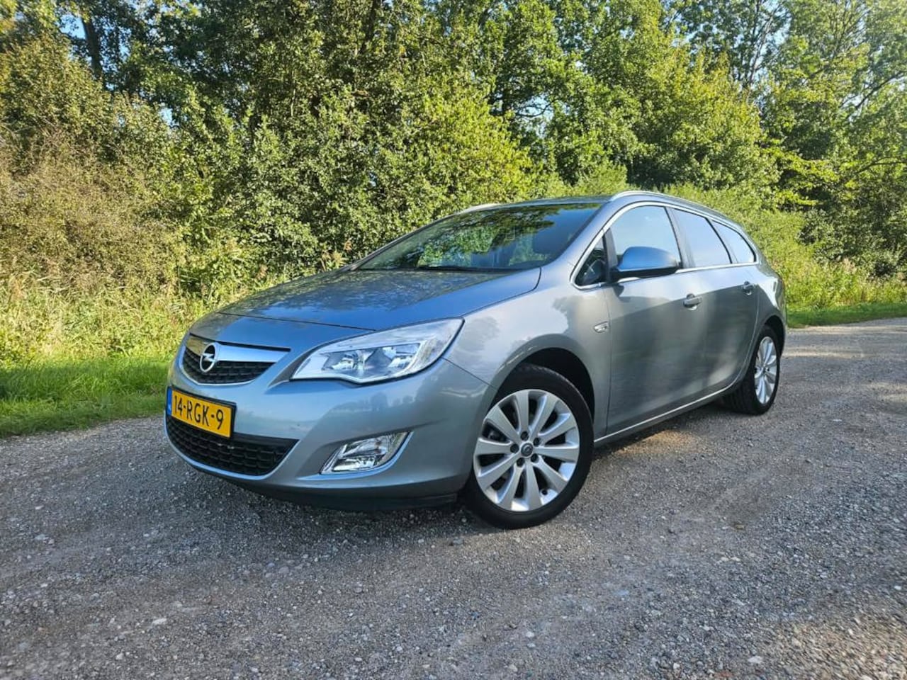 Opel Astra Sports Tourer - 1.4 Turbo Cosmo AIRCO I CRUISE - AutoWereld.nl