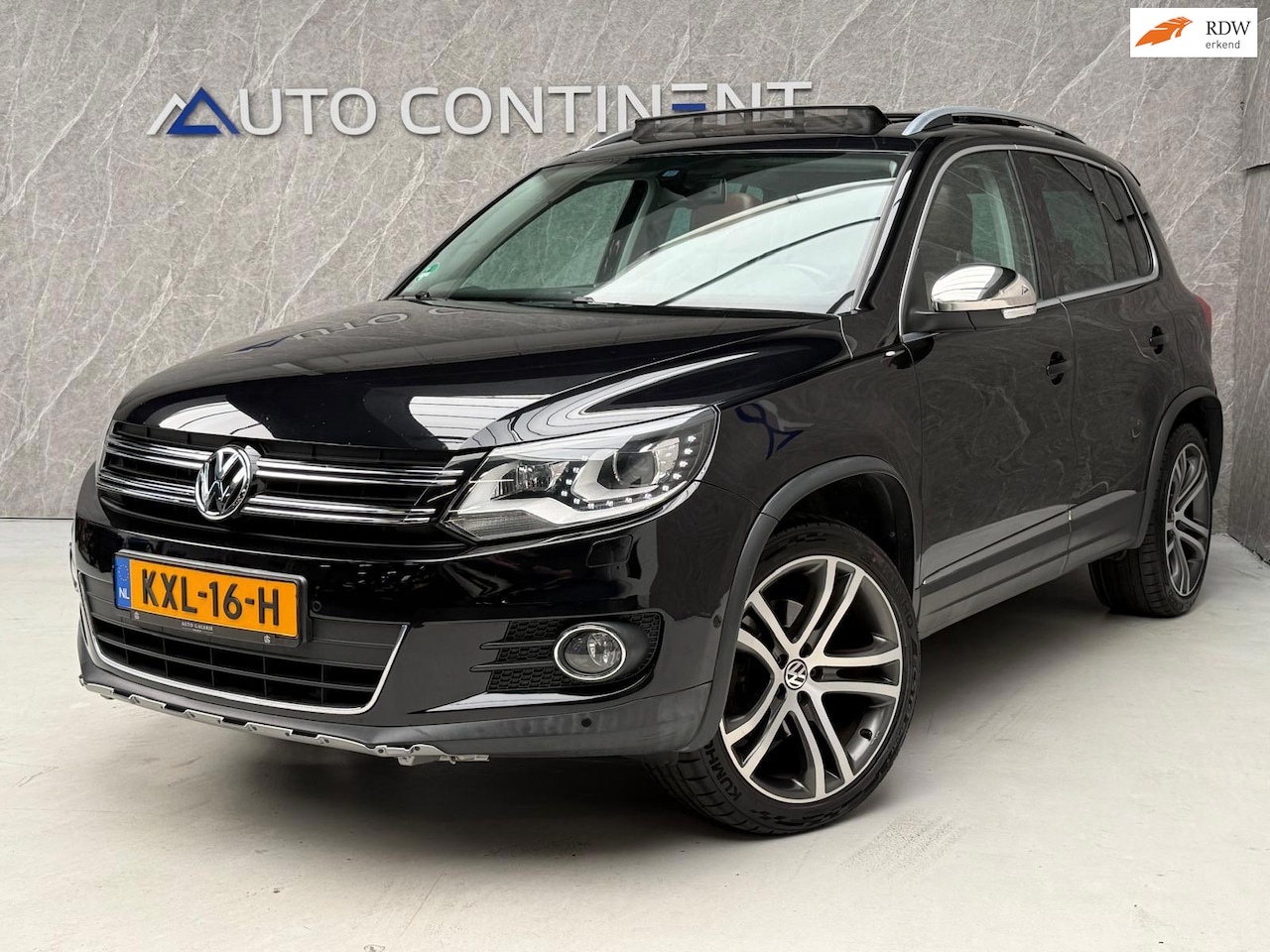 Volkswagen Tiguan - 2.0 TSI Sport&Style 4Motion 211 PK / Onderhouden - AutoWereld.nl