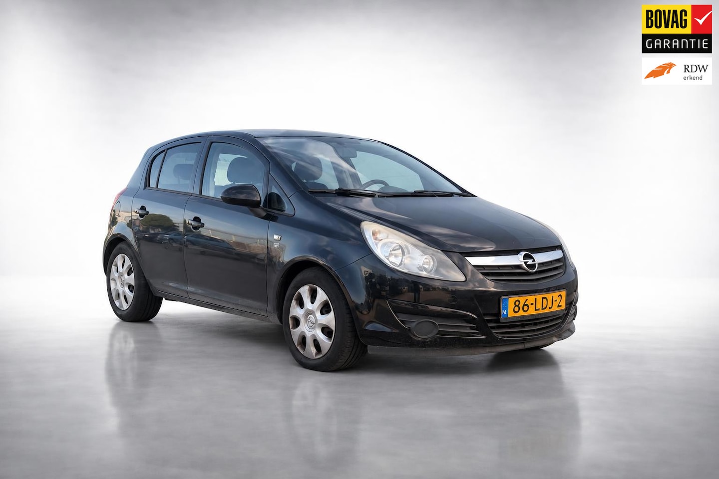 Opel Corsa - 1.4-16V '111' Edition|airco|NAP|ruime APK - AutoWereld.nl