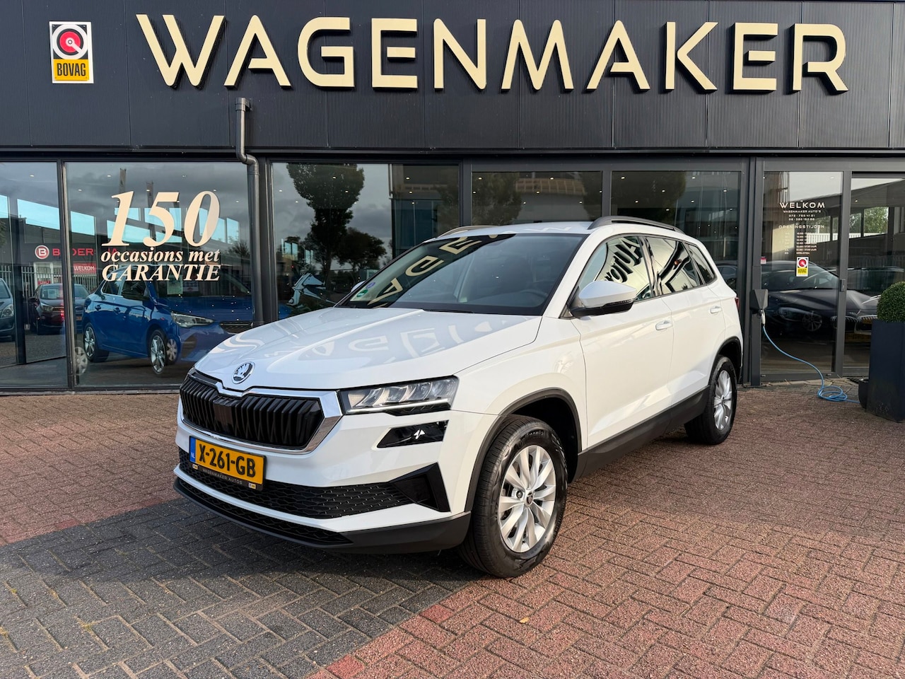 Skoda Karoq - 1.5 TSI ACT Business Edition AUT|NAVI|Trekhaak! - AutoWereld.nl