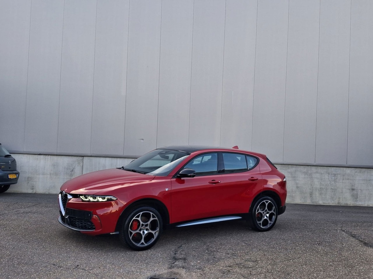 Alfa Romeo Tonale - 1.5T Hybrid Ti|Pano|Nav|Alfa Rood|Trekhaak|1e Eigenaar|Nieuwstaat - AutoWereld.nl