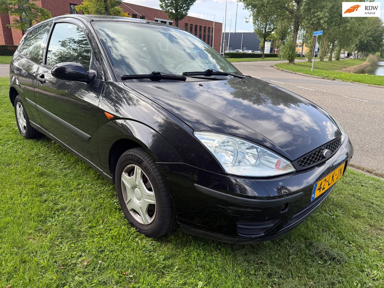 Ford Focus - 1.4-16V Cool Edition 1.4-16V Cool Edition - AutoWereld.nl