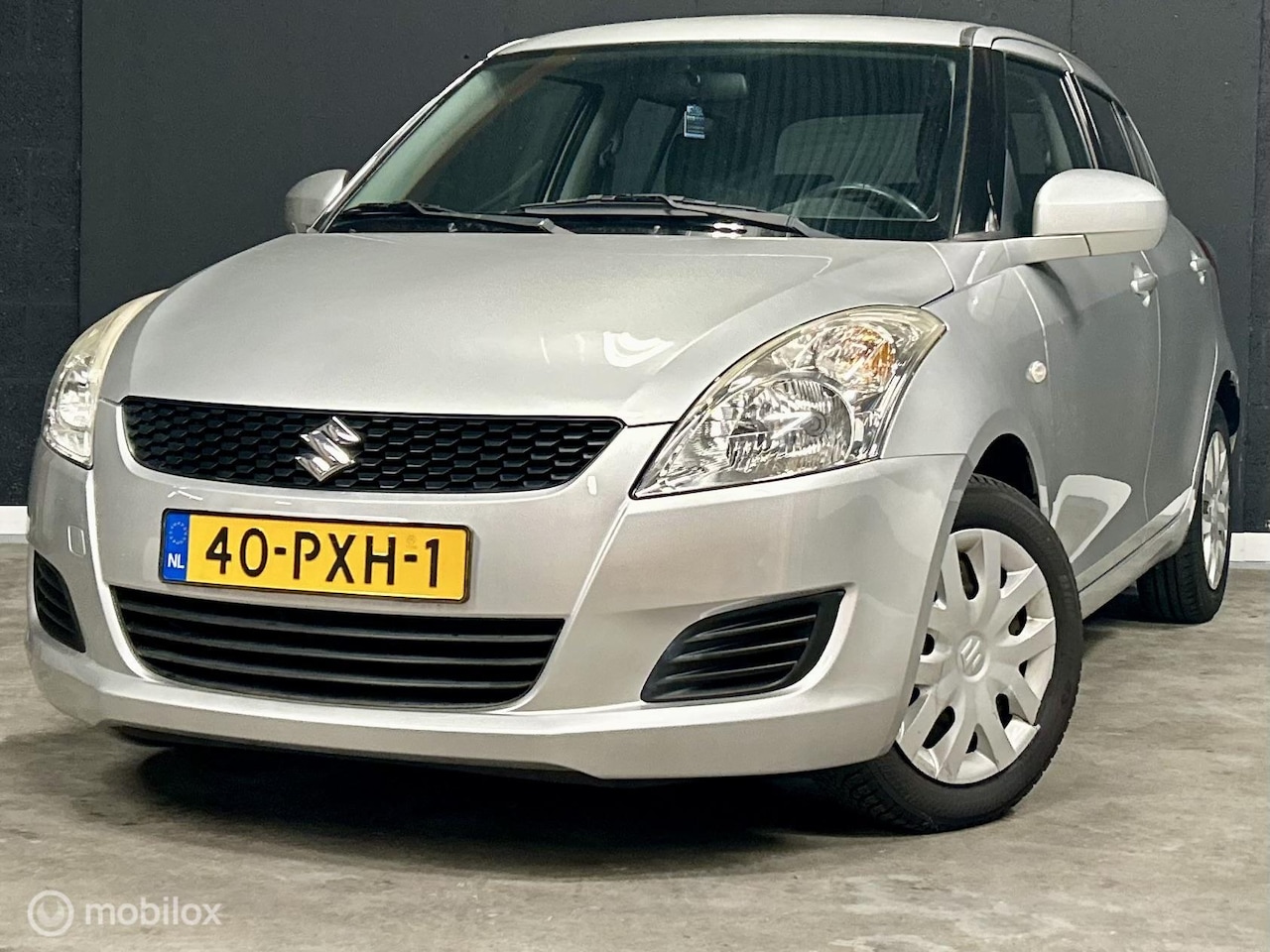 Suzuki Swift - 1.2 Exclusive 1.2 Exclusive - AutoWereld.nl