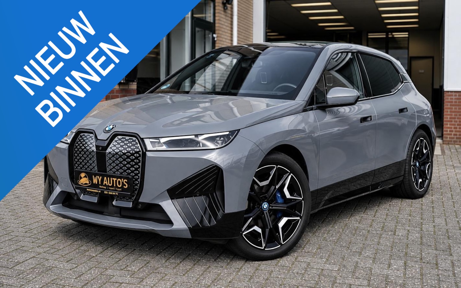 BMW iX - xDrive50 112 kWh M-Sport |Individual Storm Bay|B&W Diamond|Massage|Laser|Trekhaak|Sky Loun - AutoWereld.nl