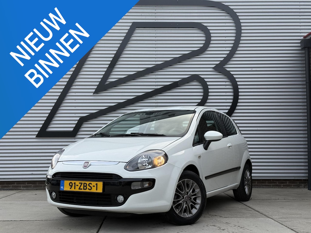 Fiat Punto Evo - 1.2 Pop 2e Eigenaar|Airco|Cruise|Elektr. Ramen|APK tot 07-2027 - AutoWereld.nl