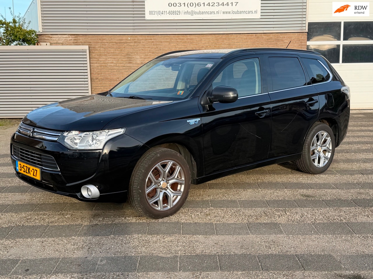 Mitsubishi Outlander - 2.0 PHEV instyle 2013 open dak camera hagel schade - AutoWereld.nl