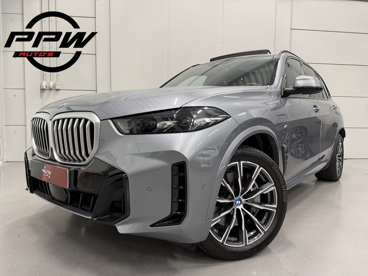 BMW X5 - xDrive50e M-Sport SKYSCRAPER/PANO-SKY LOUNGE/TREKHAAK/MERINO LEER COMFORT/LUCHTVERING/H&K/ - AutoWereld.nl