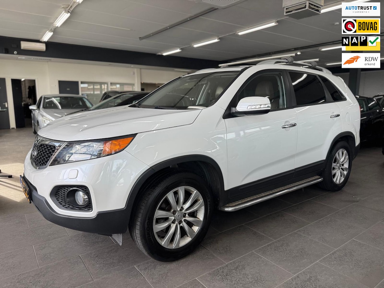 Kia Sorento - 2.4 X-clusive 7p. LPG g3 automaat 1-eigenaar camera navi panoramadak leef clima xenon vol - AutoWereld.nl