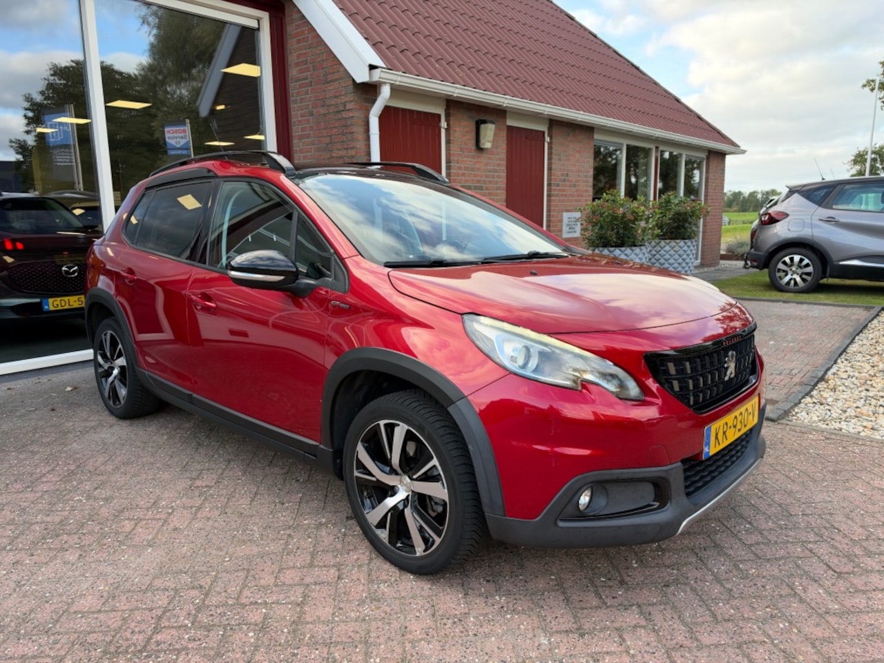 Peugeot 2008 - 1.2 PURETECH GT-LINE PANO/AIRCO/NAVI/ENZ. - AutoWereld.nl