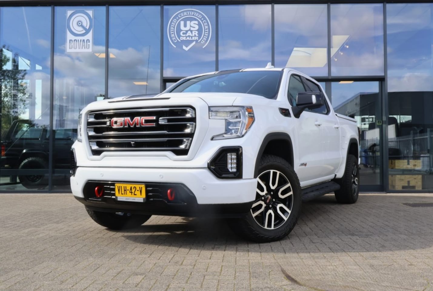 GMC Sierra - 6.2i V8 AT4 4x4 Aut. LPG Prins / Laadbakdeksel / 1e eigenaar - AutoWereld.nl