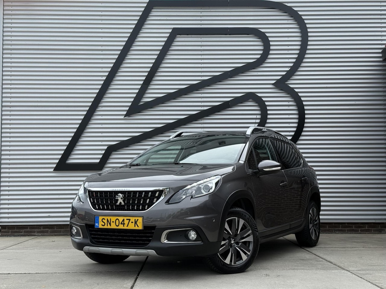 Peugeot 2008 - 1.2 PureTech Allure 2e Eigenaar|Navi|Pano|Camera|Carplay|Clima|Cruise|N.A.P|Nieuwe APK bij - AutoWereld.nl