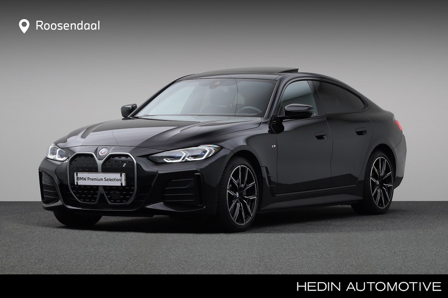 BMW i4 - eDrive40 High Executive 84 kWh M-Sport | Camera | Stoelverwarming | Hi-Fi | Open dak | 19" - AutoWereld.nl