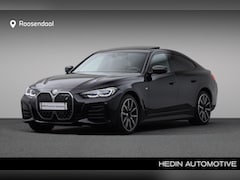 BMW i4 - eDrive40 High Executive 84 kWh M-Sport | Camera | Stoelverwarming | Hi-Fi | Open dak | 19"