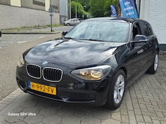 BMW 1-serie - 116i High Executive*rijd perfect*navi*airco*velgen*apk*nette auto*inruil mog