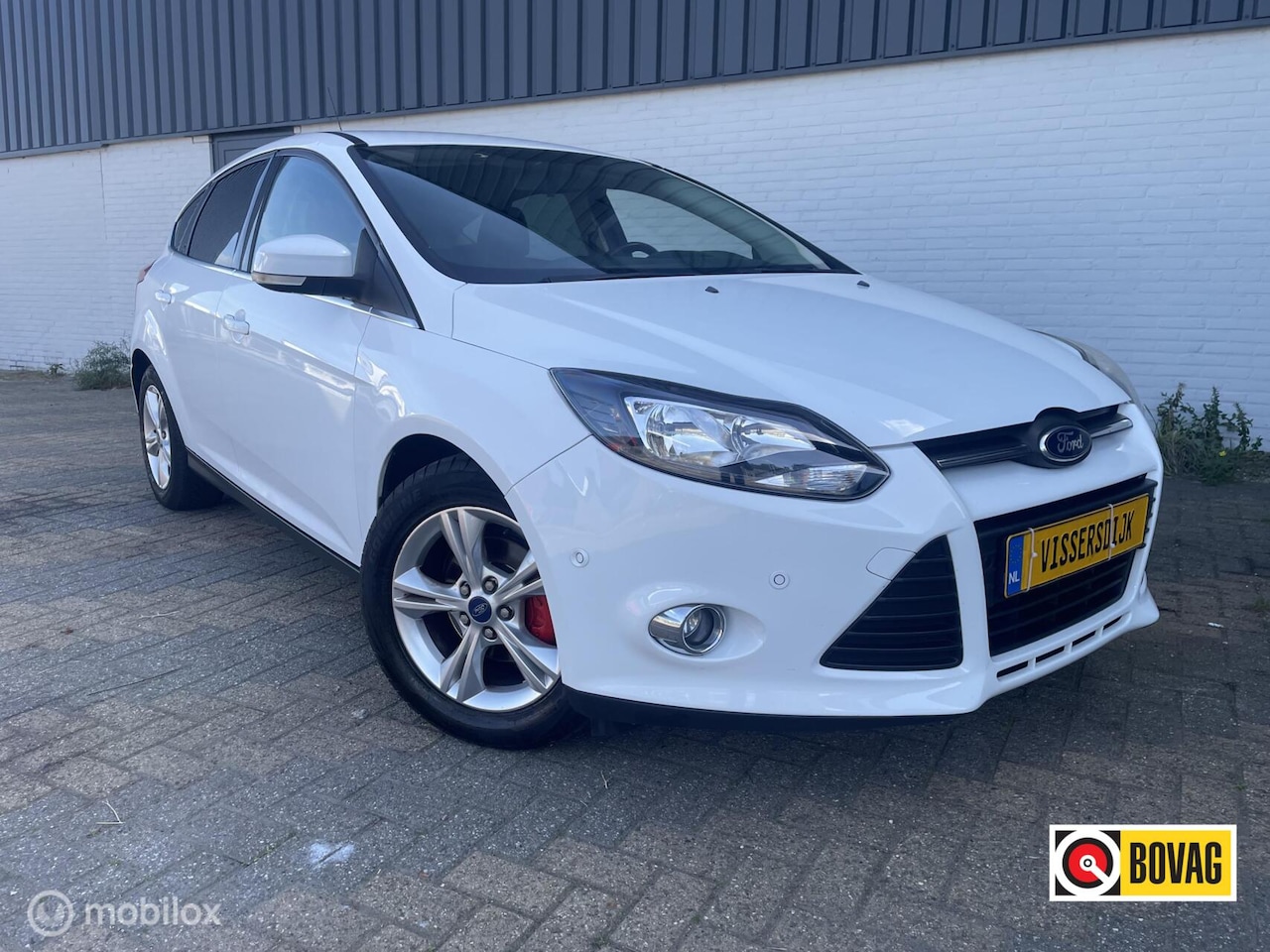 Ford Focus - 1.0 EcoBoost Titanium | Met APK - AutoWereld.nl