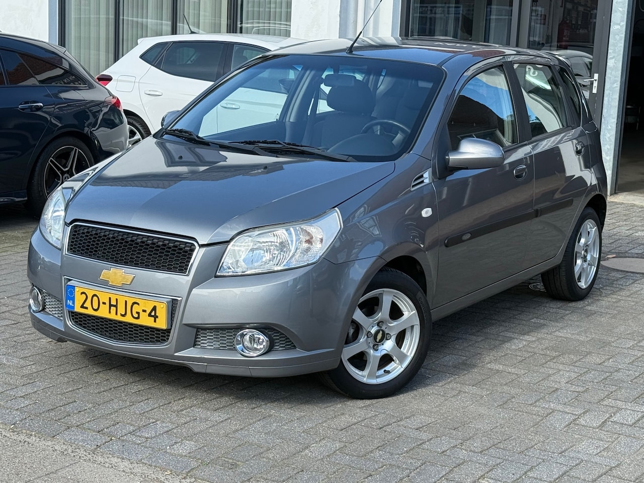 Chevrolet Aveo - 1.2 16V LS 1.2 16V LS, Airco, Trekhaak, L.M.Velgen, Stuurbekrachtiging, Isofix - AutoWereld.nl
