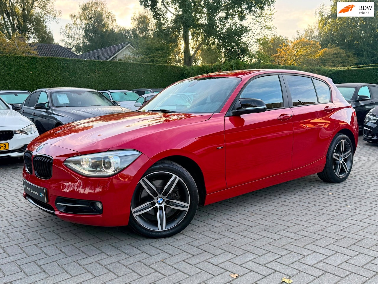 BMW 1-serie - 118i Business Sport|Ketting vervangen|Navigatie|Cruise control|Climate control|Stoelverw.| - AutoWereld.nl
