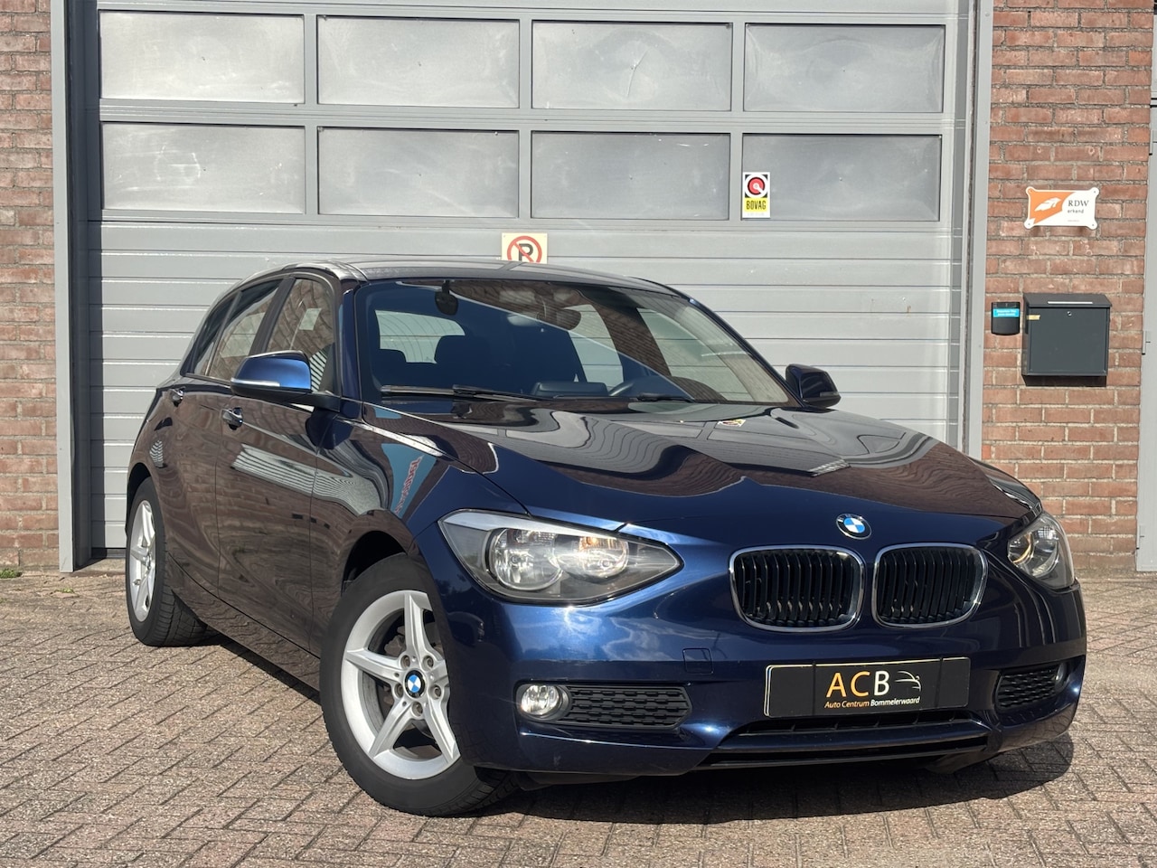 BMW 1-serie - 114i EDE Navigatie/ LM velgen - AutoWereld.nl