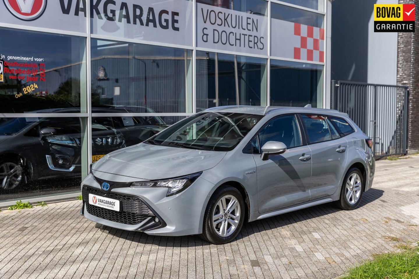 Toyota Corolla Touring Sports - 1.8 Hybrid Dynamic Business - AutoWereld.nl