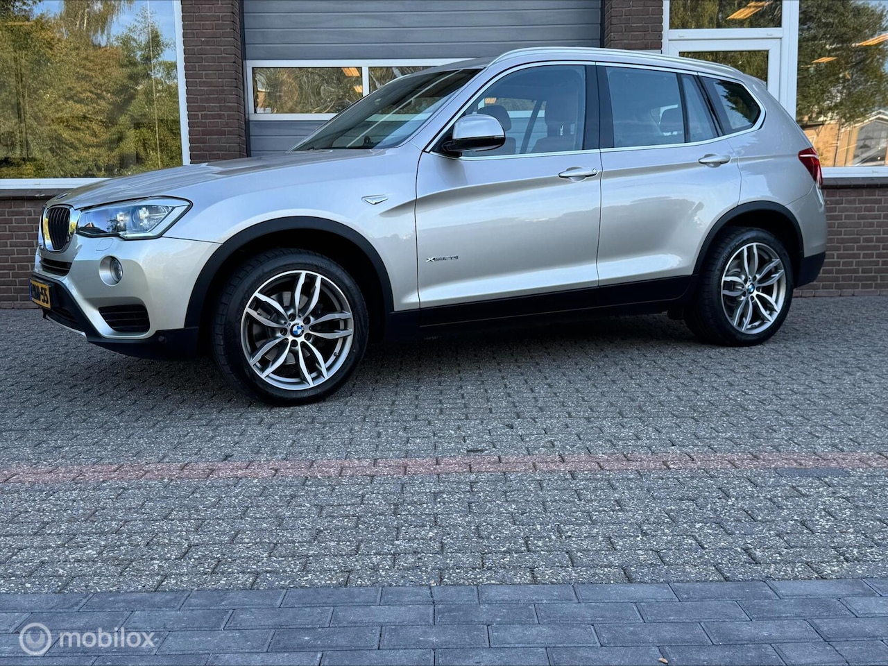 BMW X3 - xDrive20i HIGH EXE LEDER/PANO/ECC-AIRCO/CRUISE - AutoWereld.nl