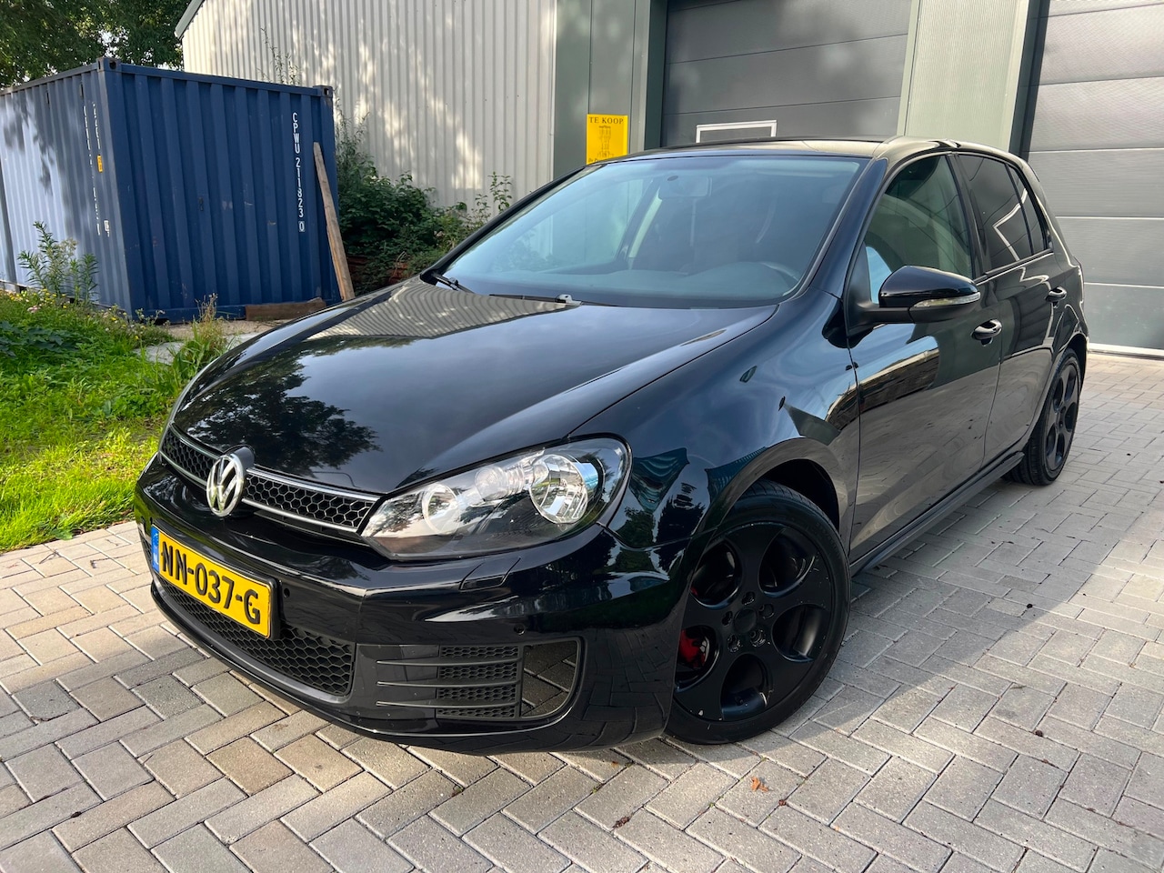 Volkswagen Golf - 1.4TSI Highline black on black - AutoWereld.nl