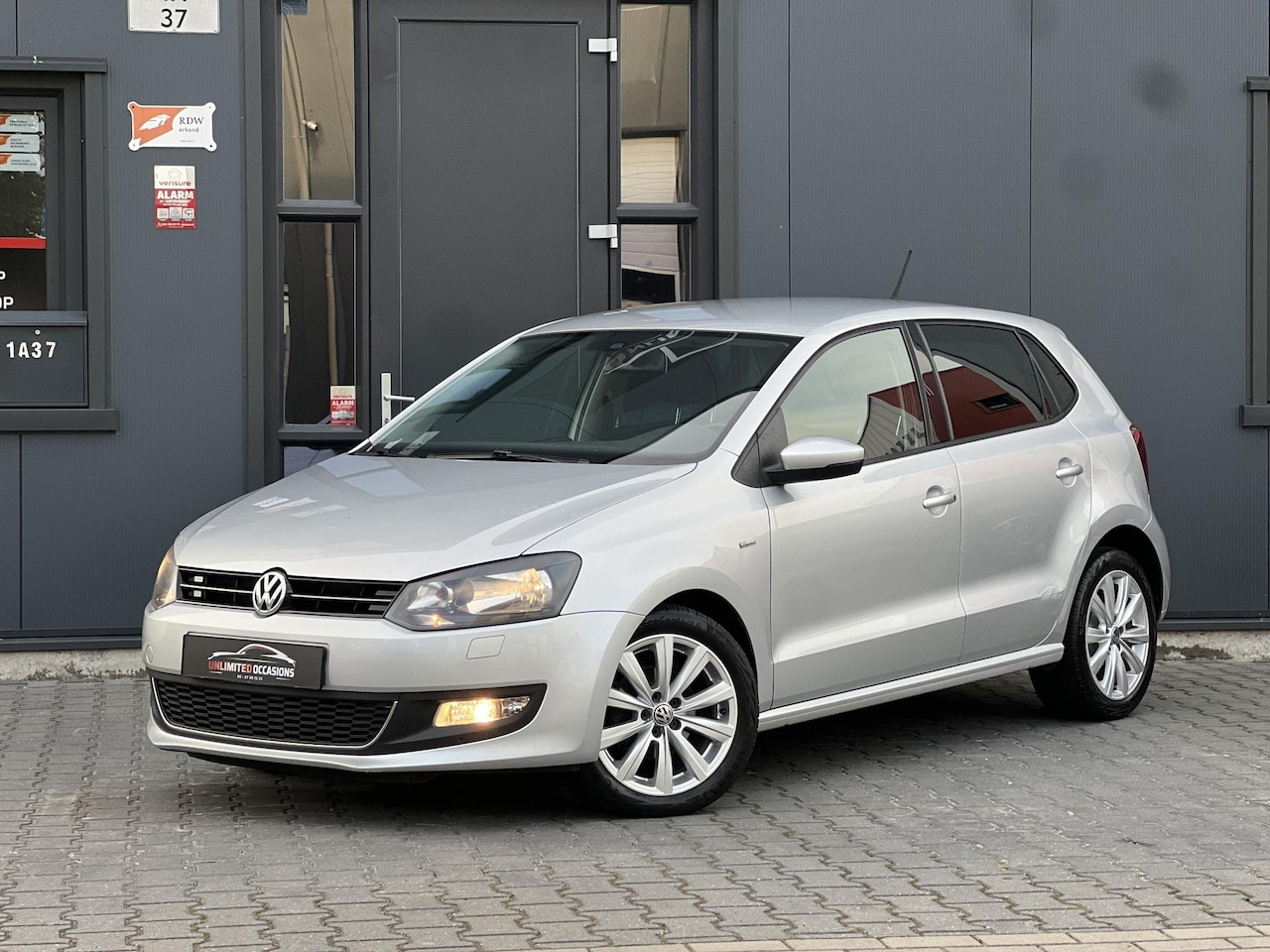 Volkswagen Polo - 1.2-12V BlueMotion Life *ECC*CRUISE*PDC - AutoWereld.nl