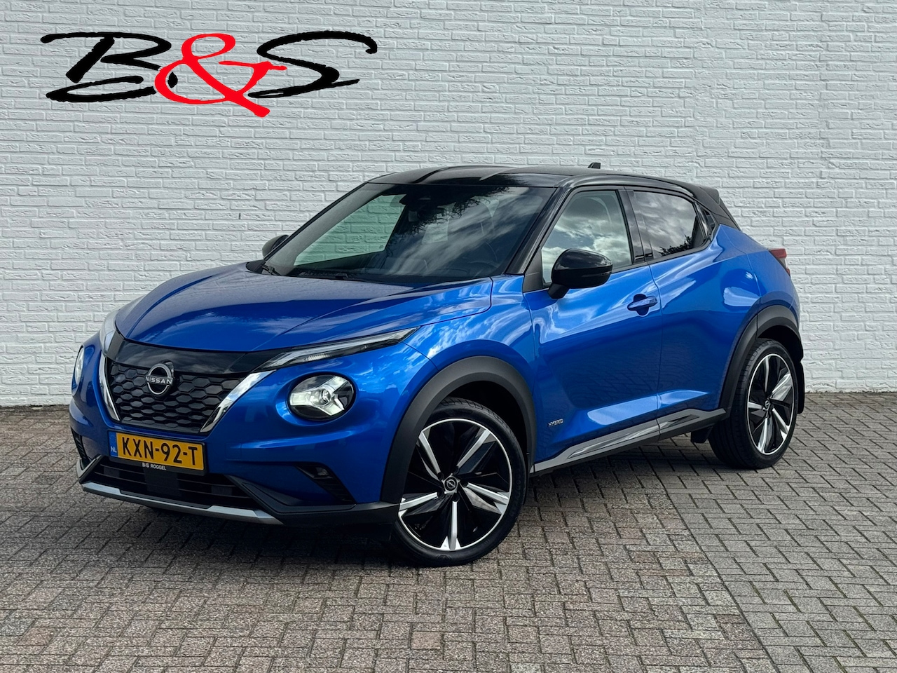 Nissan Juke - 1.6 Hybrid Premiere Ed. N-Design Trekhaak Adaptive Cruise Climate Controle Volleder Camera - AutoWereld.nl