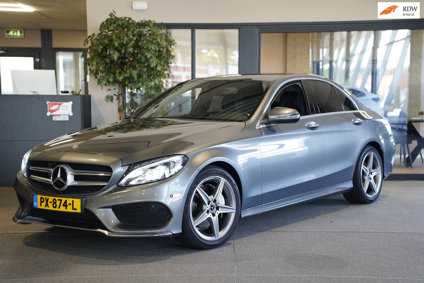 Mercedes-Benz C-klasse - 180 AMG DCT Navi Leder Cruise Cam Pdc Burmester - AutoWereld.nl