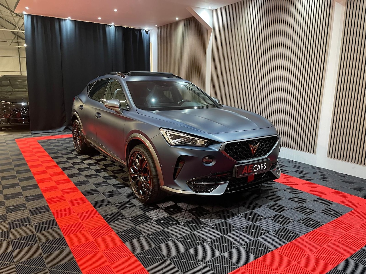 CUPRA Formentor - 1.4 e-Hybrid VZ Copper Edition Pano Cam Led Leder Memory Matt Blue - AutoWereld.nl