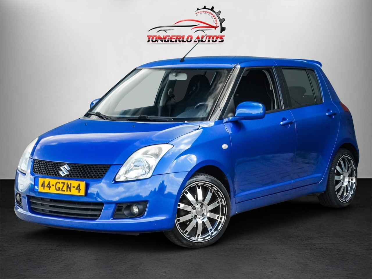 Suzuki Swift - 1.3 Bandit Clima 5drs Trekhaak Keyless - AutoWereld.nl