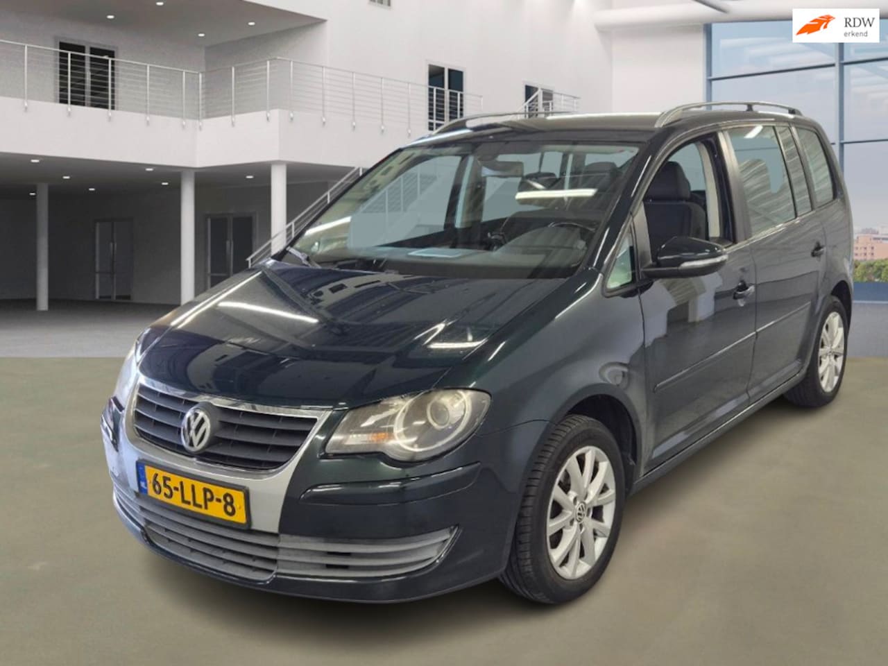 Volkswagen Touran - 1.4 TSI Comfortline AUTOMAAT NAVI PSENSOR CRUISE TREKHAAK 2 X SLEUTELS - AutoWereld.nl