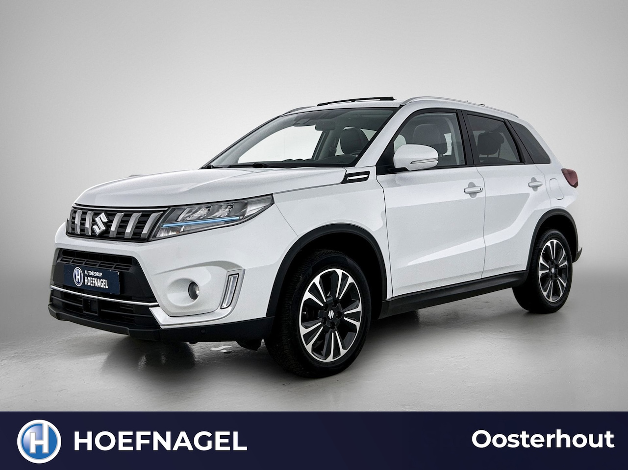 Suzuki Vitara - 1.4 Boosterjet Style Smart Hybrid | Adaptive Cruise | Stoelverwarming | CarPlay | Camera | - AutoWereld.nl