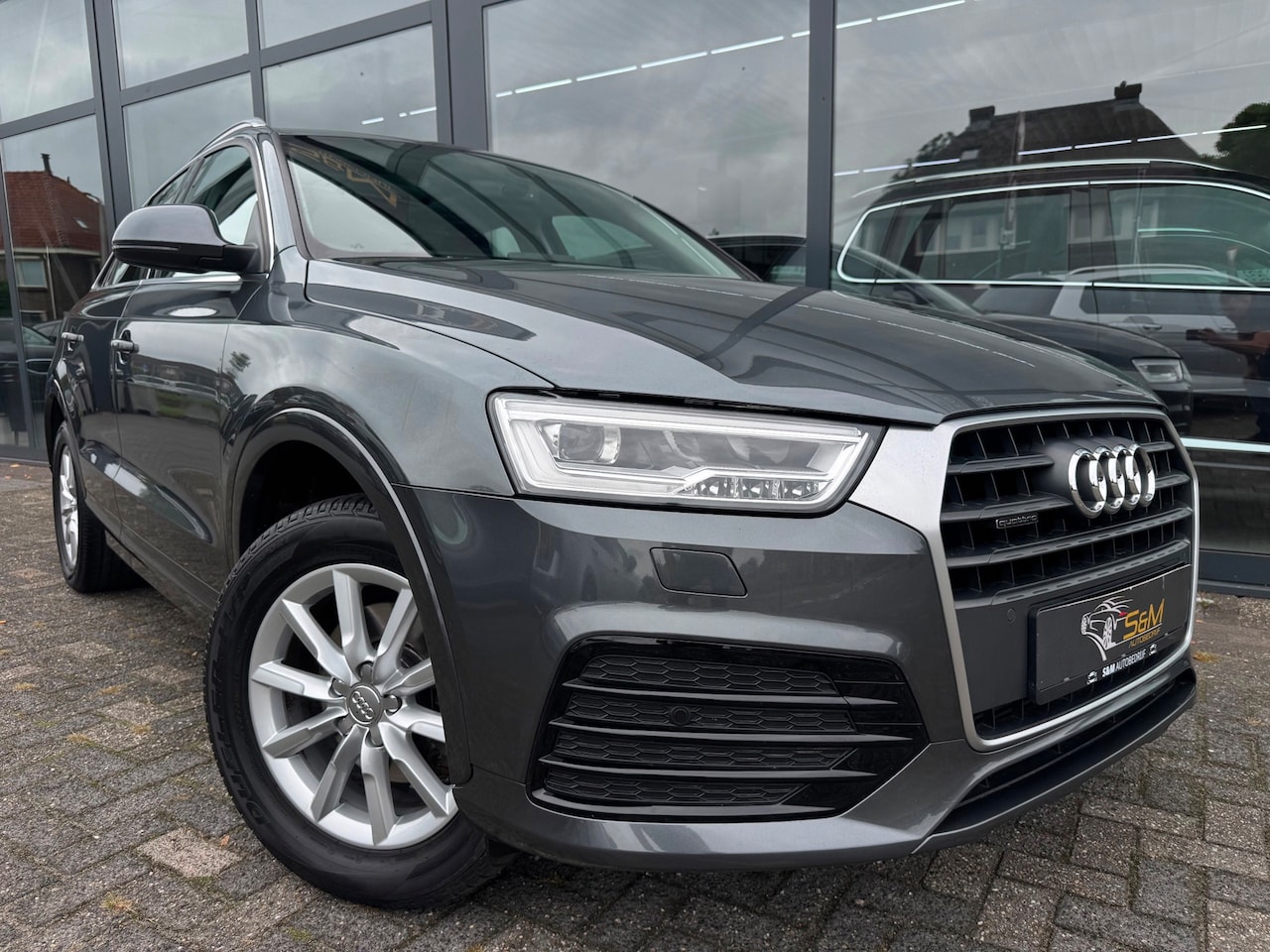 Audi Q3 - 2.0 TFSI quattro Design Pro Line Plus 2.0 TFSI quattro Design Pro Line Plus - AutoWereld.nl