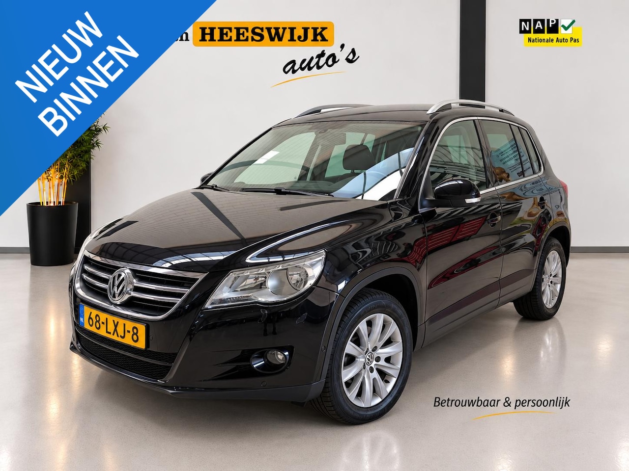 Volkswagen Tiguan - 1.4 TSI Sport&Style 4Motion Nieuwe Ketting | Airco automatisch | Pdc | Navigatie - AutoWereld.nl