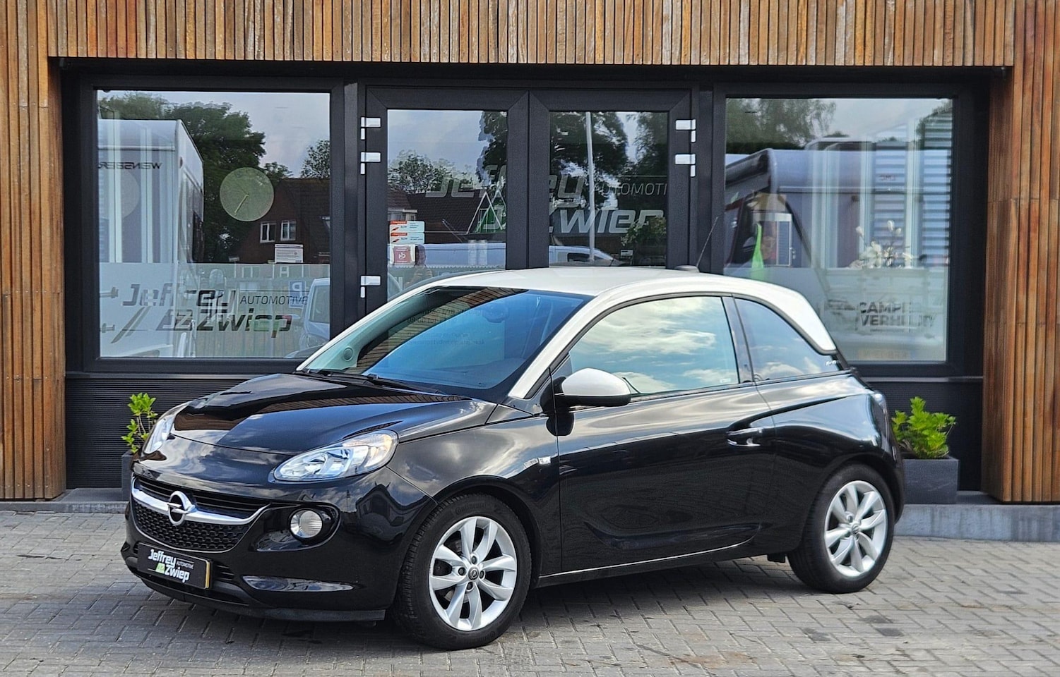 Opel ADAM - 1.0 Turbo Unlimited airco. parkeersensor. lichtmetaal. - AutoWereld.nl
