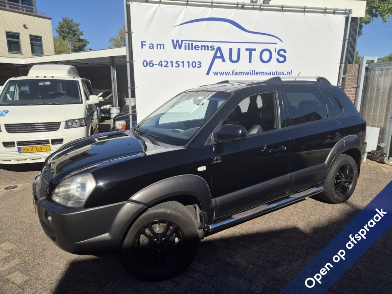 Hyundai Tucson - 2.7i V6 4WD Style 2.7i V6 4WD Style - AutoWereld.nl