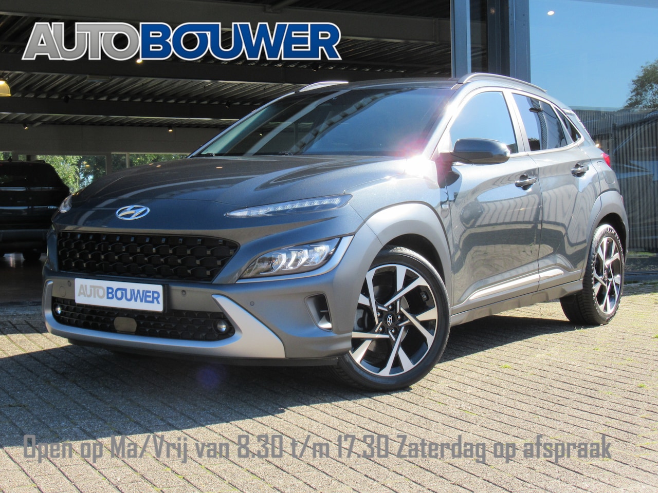 Hyundai Kona - 1.0 T-GDI Premium 1e eigen | dealer onderh | full options! leder | navi | elektr.stoelen - AutoWereld.nl