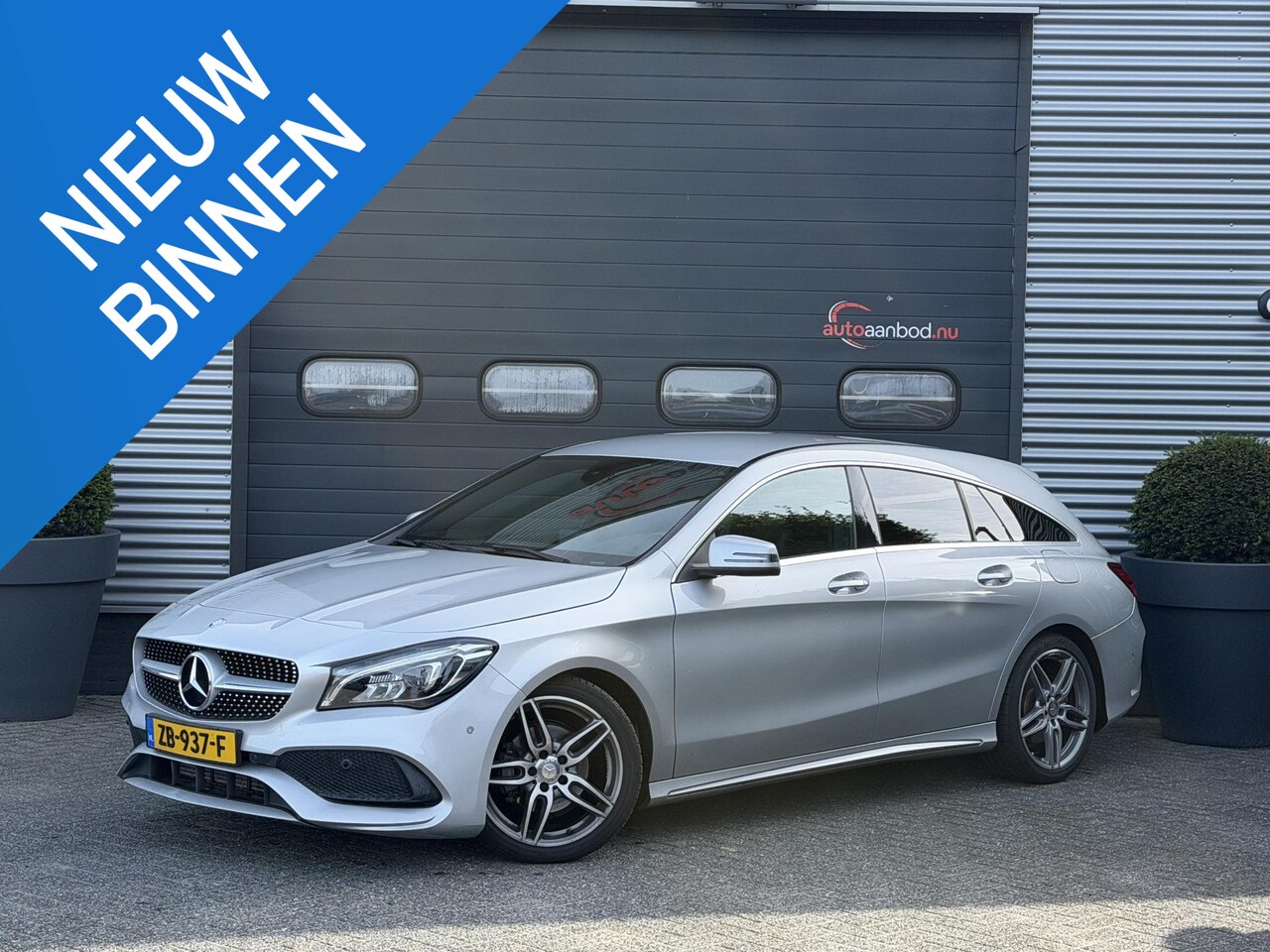 Mercedes-Benz CLA-klasse Shooting Brake - 180 AMG | Navigatie | Parkeersensoren | Stoelverwarming | Lichtmetalen Velgen | - AutoWereld.nl