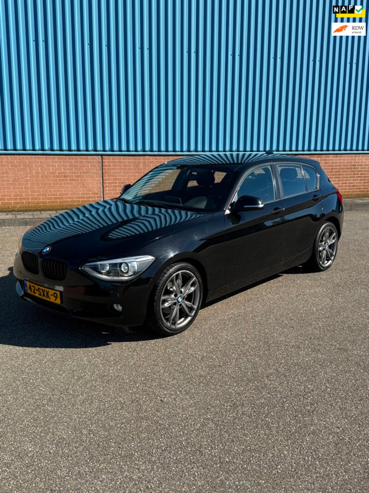 BMW 1-serie - 116i nieuwe beurt, apk en CarPlay - AutoWereld.nl
